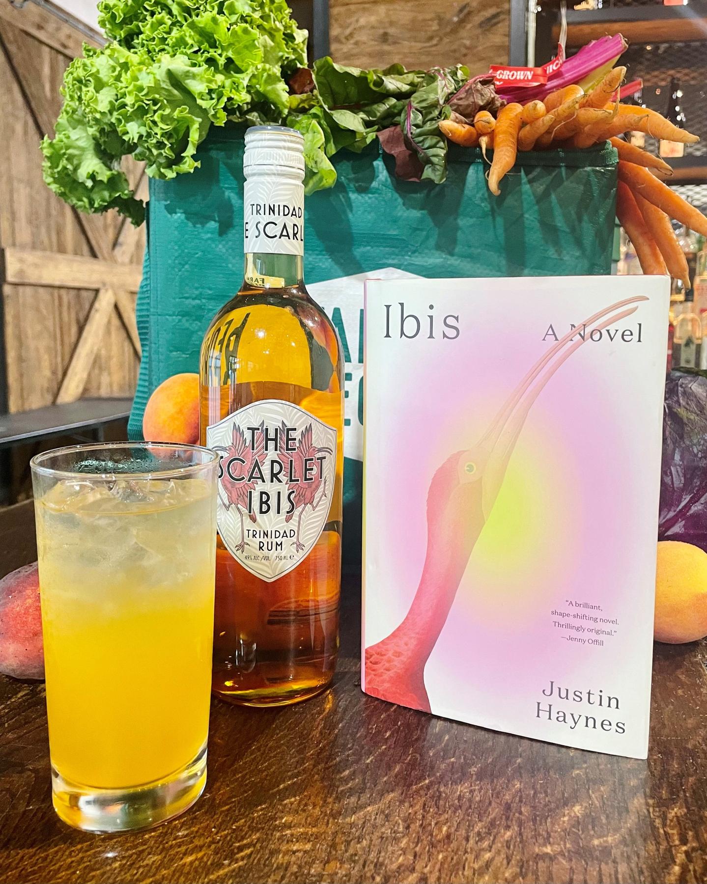 An example of the The Clearing, the mixed drink (drink), by Sammi Katz, featuring lager, The Scarlet Ibis Trinidad Rum, mango juice, lime juice, rich demerara syrup, and lager; photo by Olivia McGiff