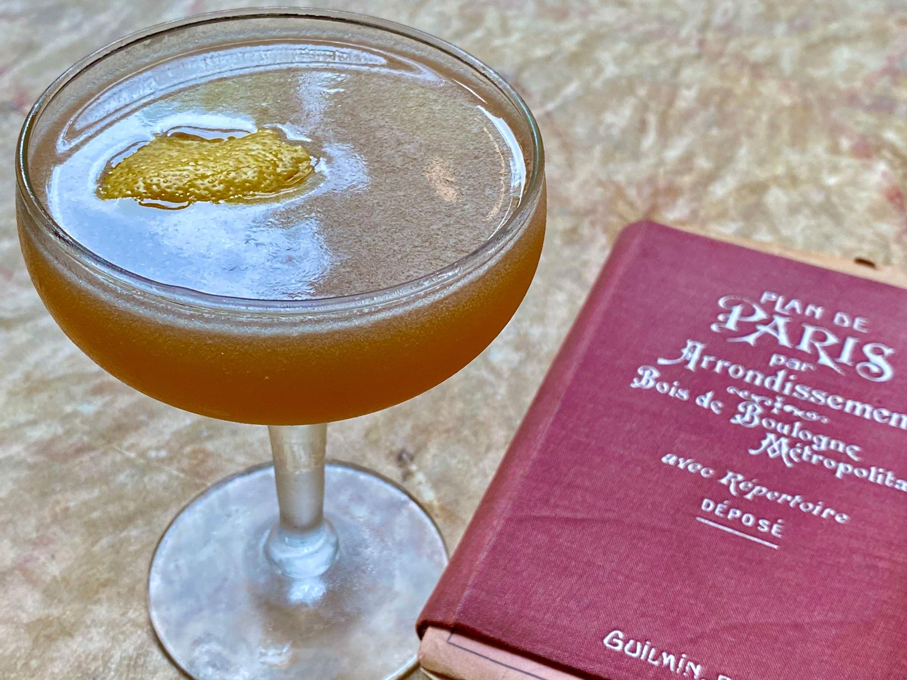 An example of the Champs Elysees, the mixed drink (drink), adapted from a drink in the Savoy Cocktail Book, featuring grape brandy, Dolin Génépy le Chamois Liqueur, lemon juice, simple syrup, Angostura bitters, and lemon twist; photo by Martin Doudoroff