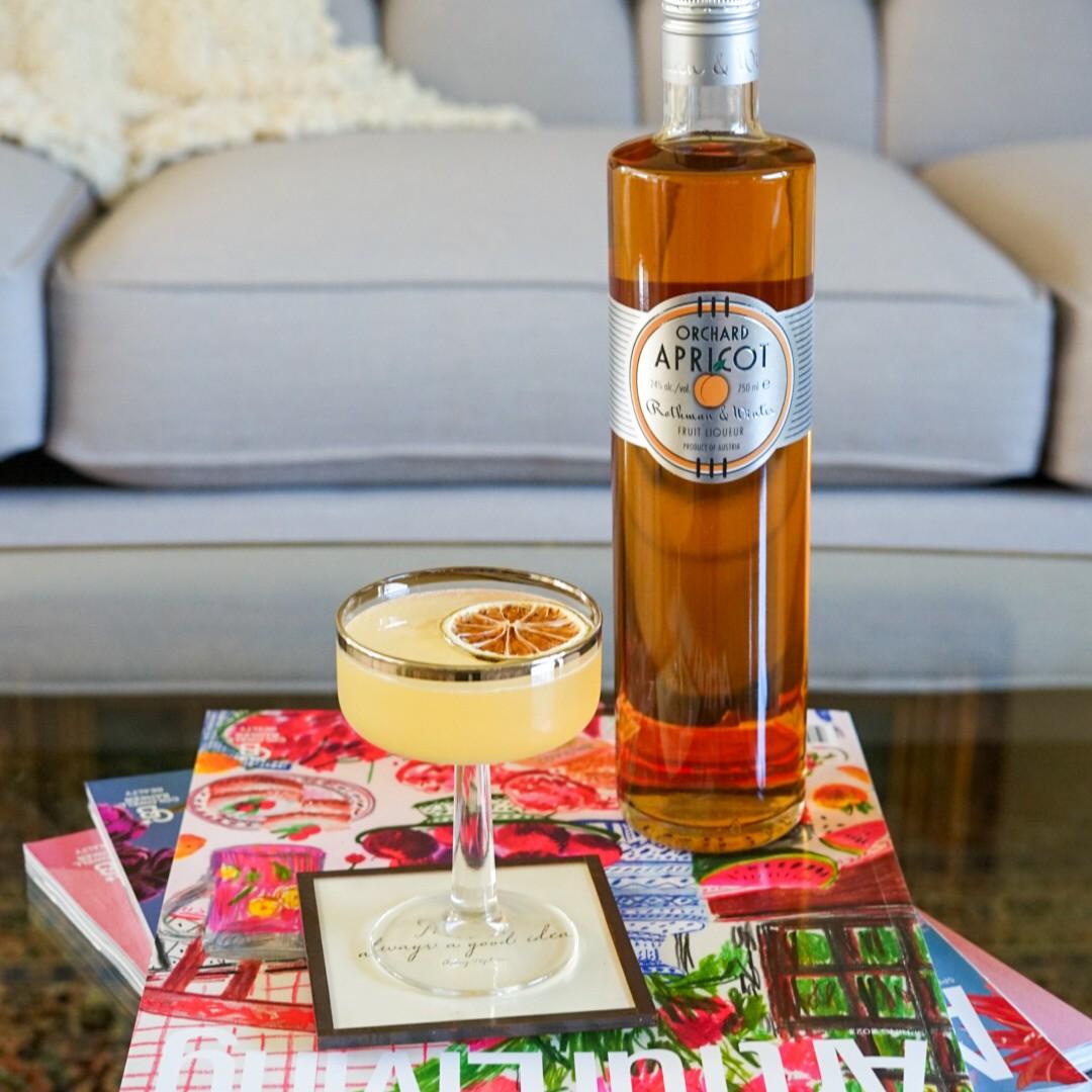 An example of the Hotel Nacional, the mixed drink (drink) featuring brown rum, pineapple juice, Rothman & Winter Orchard Apricot Liqueur, simple syrup, lime juice, and lime wheel