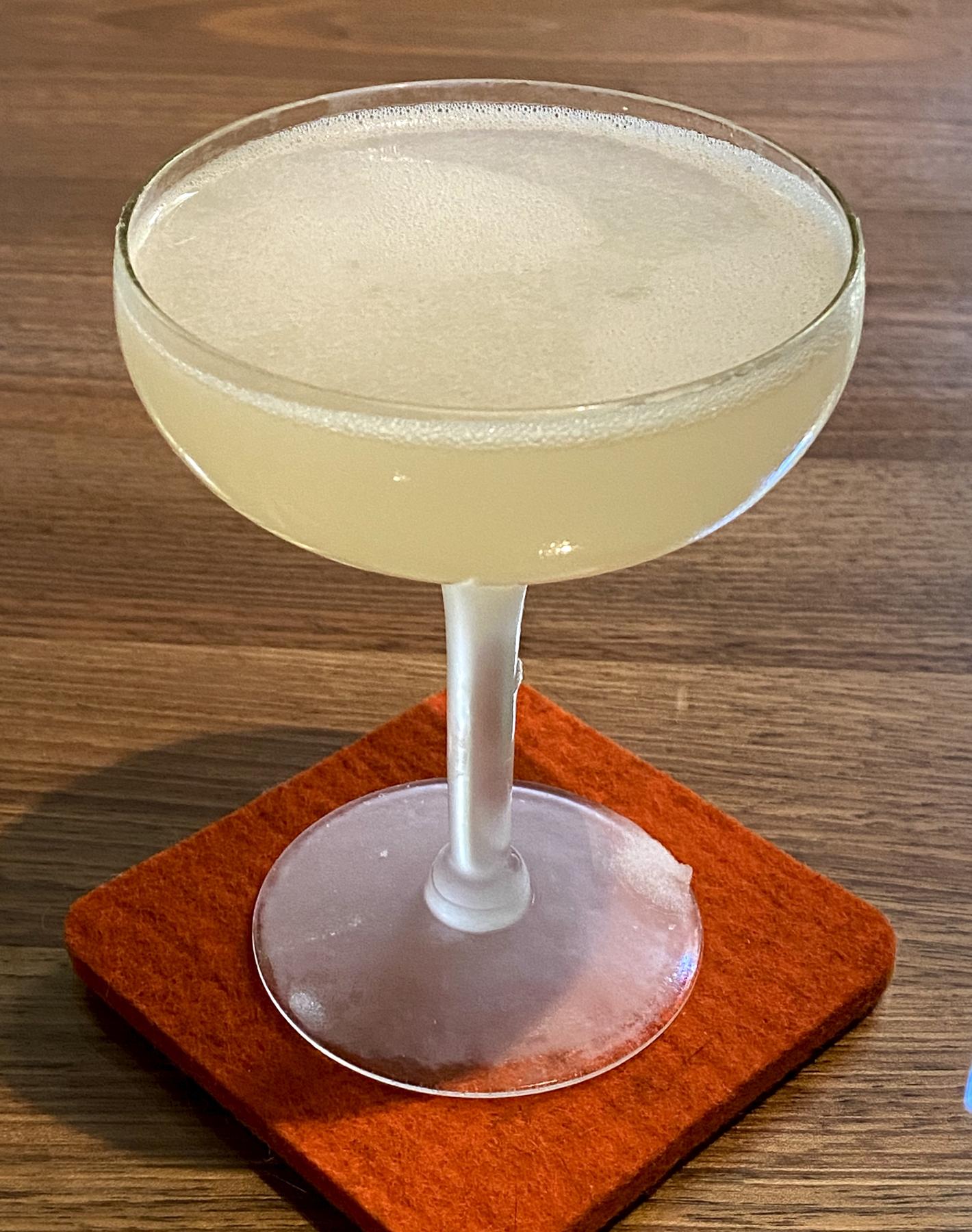 An example of the Mountain Daisy, the mixed drink (drink) featuring Salers Gentian Apéritif, Cocchi Americano Bianco, lime juice, and salt; photo by Martin Doudoroff