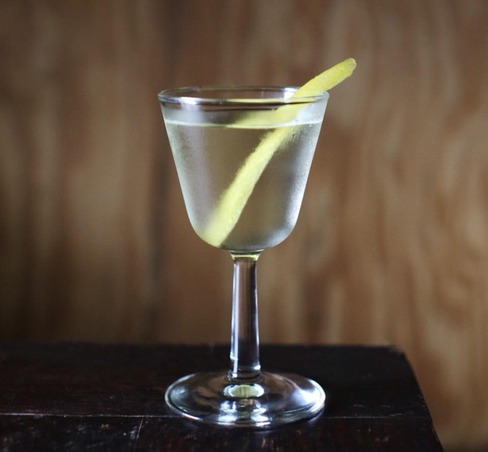 An example of the Improved Vesper, the mixed drink (drink) featuring Hayman’s London Dry Gin, vodka, Cocchi Americano Bianco, and lemon twist; photo by Christopher Ciesiel, The Campground (Kansas City, MO)