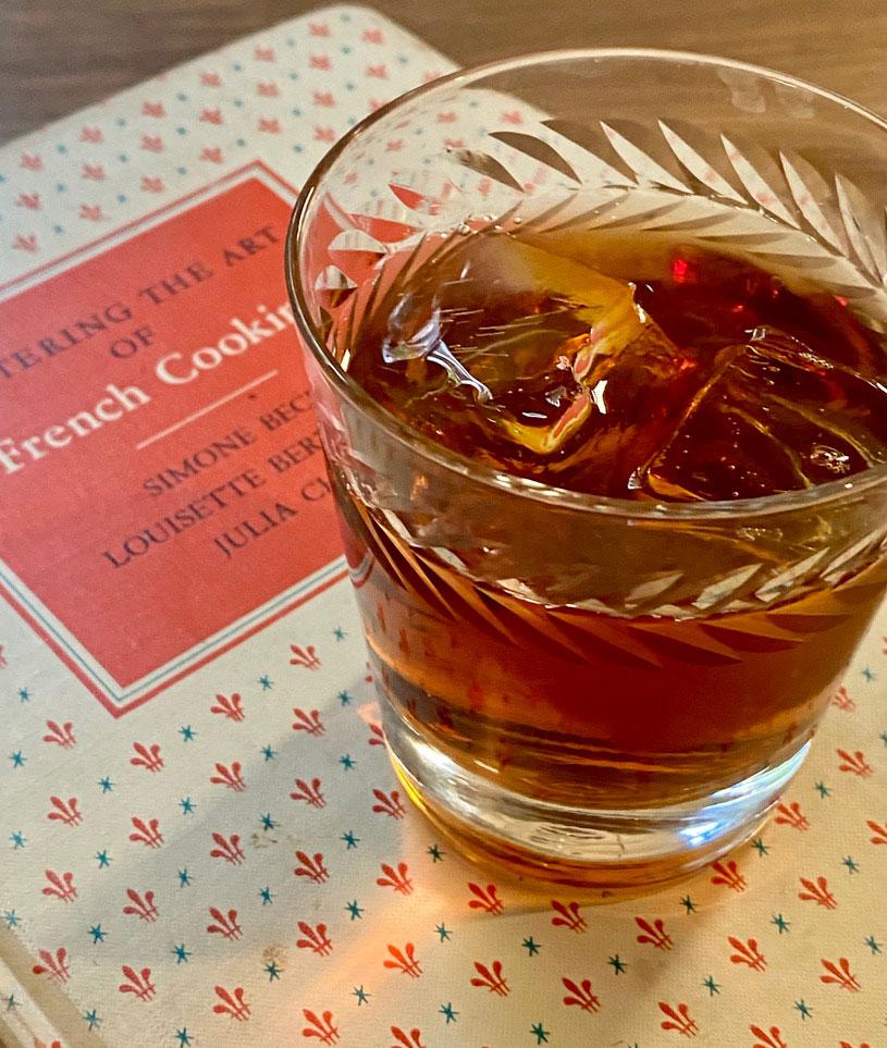 An example of the Dreyfus, the mixed drink (drink) featuring Mattei Cap Corse Blanc Quinquina, Mattei Cap Corse Rouge Quinquina, Angostura bitters, and orange bitters; photo by Martin Doudoroff