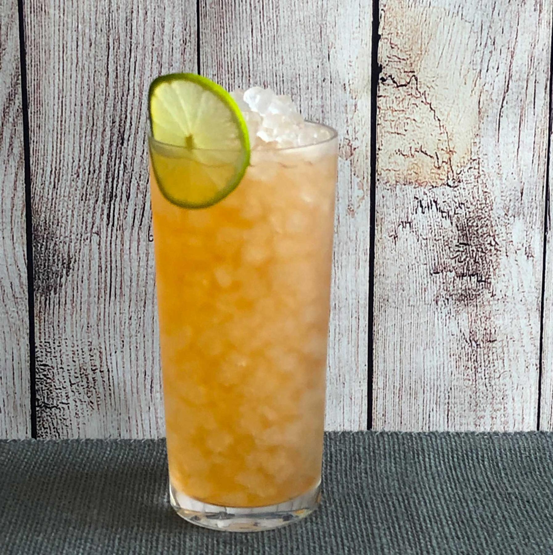 An example of the Barbados Redux, the mixed drink (drink) featuring The Scarlet Ibis Trinidad Rum, John D. Taylor’s Velvet Falernum, lime juice, Angostura bitters, and lime wheel; photo by Lee Edwards