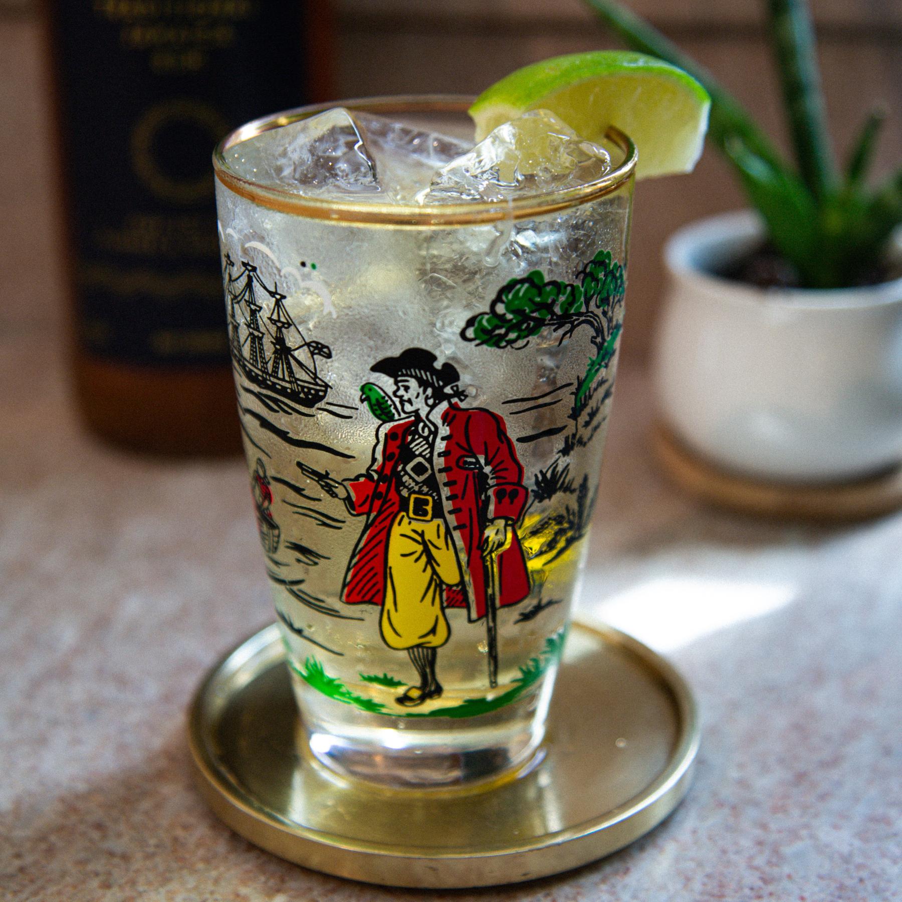 An example of the Smith & Tonic, the mixed drink (drink) featuring tonic water, Smith & Cross Traditional Jamaica Rum, and lime wedge; photo by Megan Heinowski