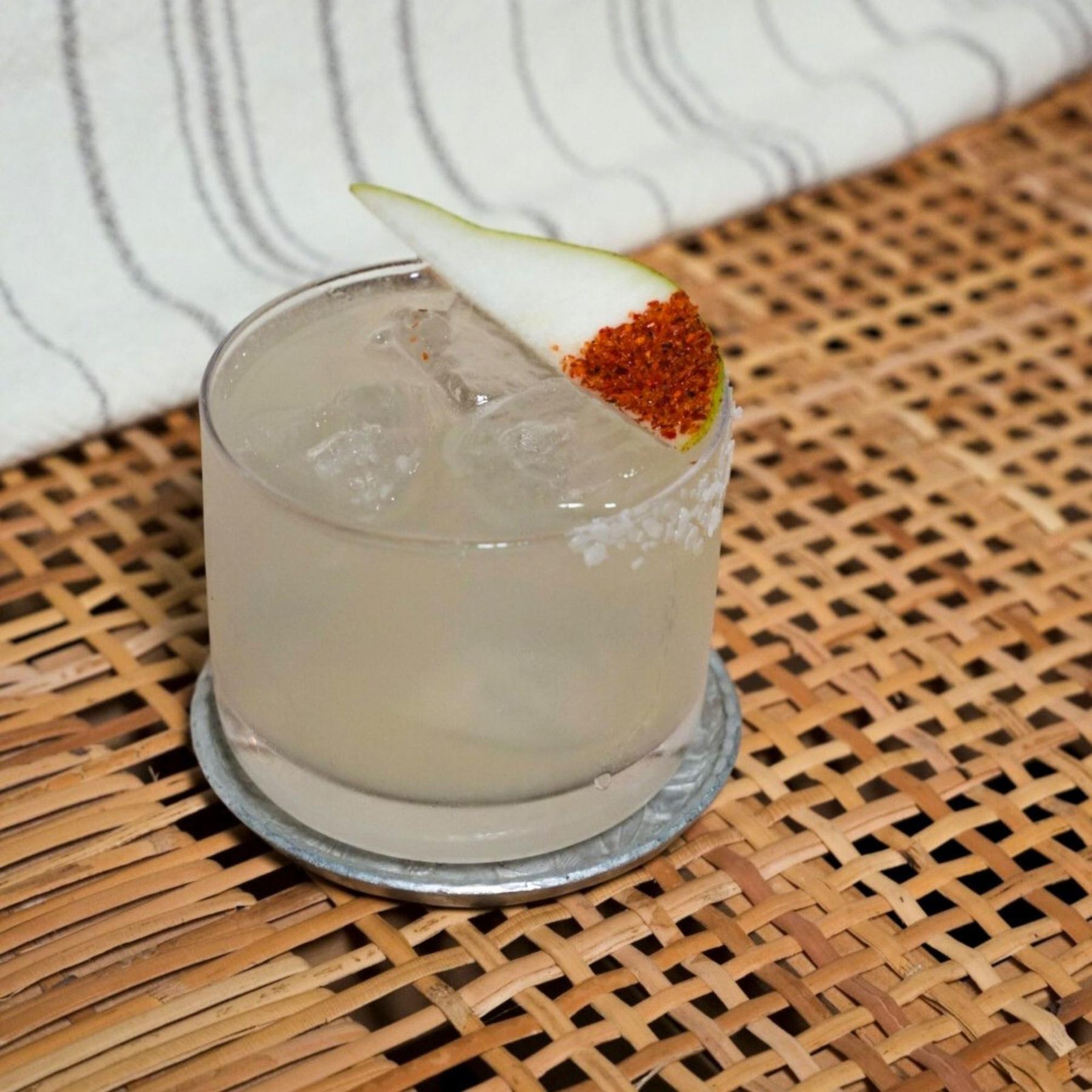 An example of the Ultimate Pear Margarita, the mixed drink (drink) featuring blanco tequila, Rothman & Winter Orchard Pear Liqueur, lime juice, and salt; photo by Madison Young