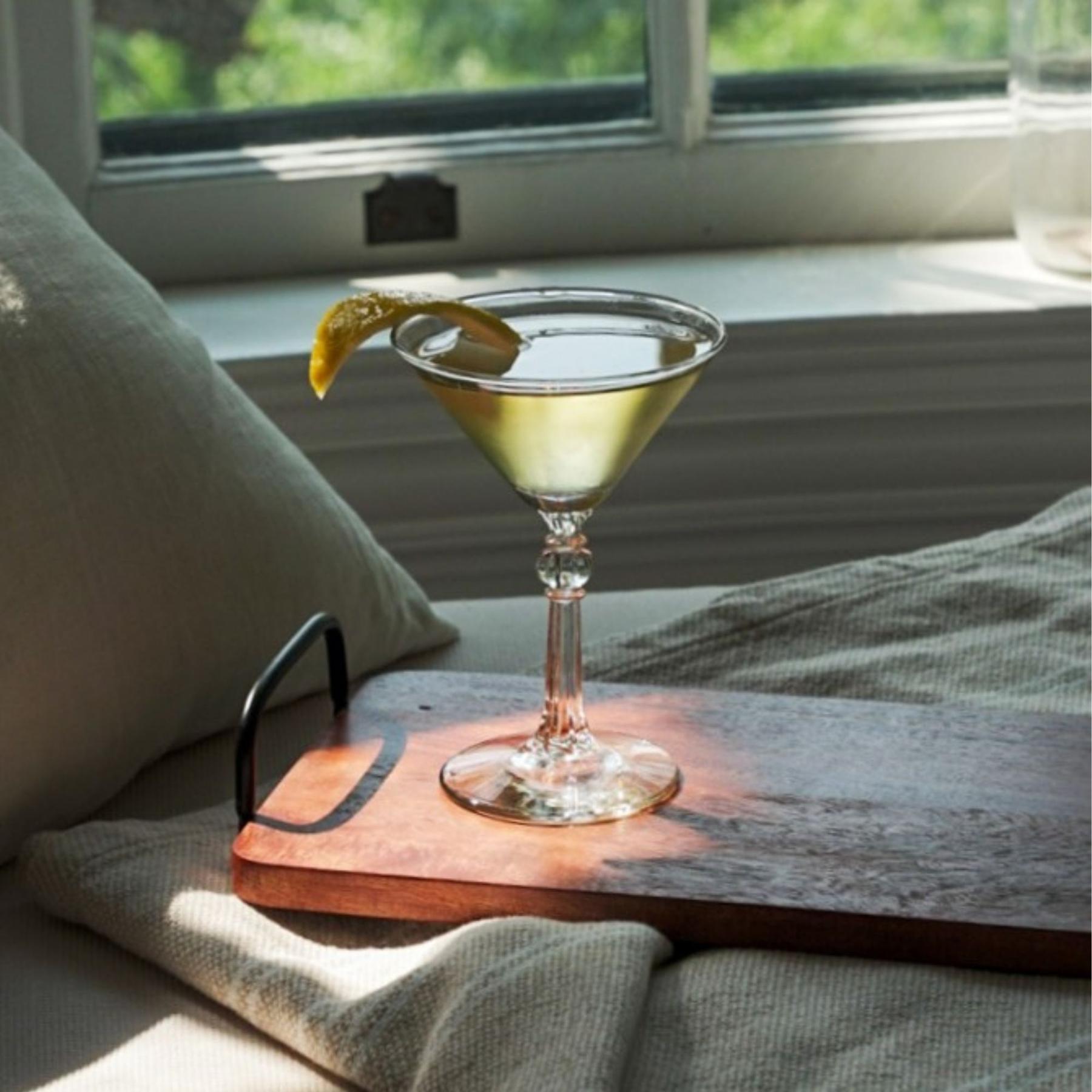 An example of the Mediterranean Martini, the mixed drink (drink) featuring Hayman’s Vibrant Citrus Gin, Mattei Cap Corse Blanc Quinquina, orange bitters, and lemon twist; photo by Madison Young