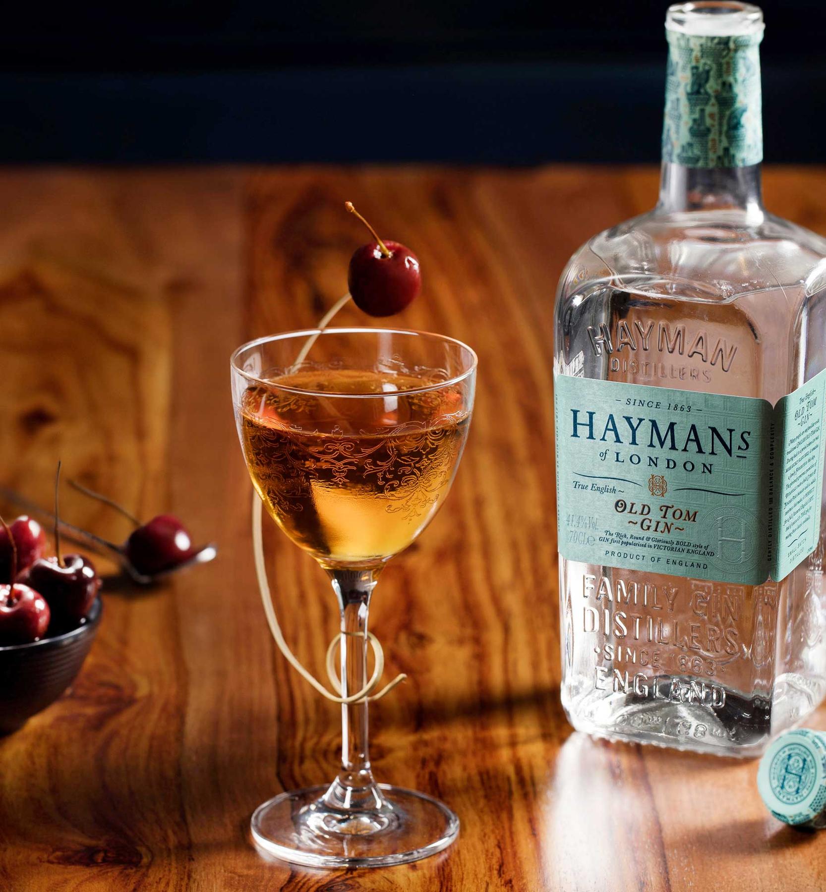 An example of the Martinez, the mixed drink (drink) featuring Hayman’s Old Tom Gin, Cocchi Vermouth di Torino ‘Storico’, maraschino liqueur, orange bitters, and orange twist; photo by Hayman’s of London