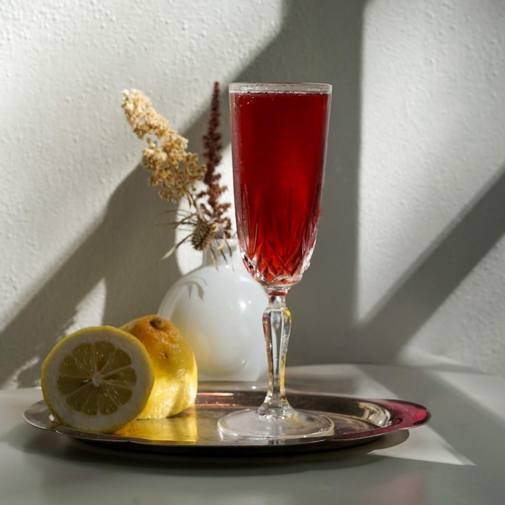 An example of the Barbarella, the mixed drink (drink), adapted from Kellie Thorn, Atlanta, featuring Cocchi Brachetto d’Acqui, vodka, Pasubio Vino Amaro, lemon juice, and simple syrup