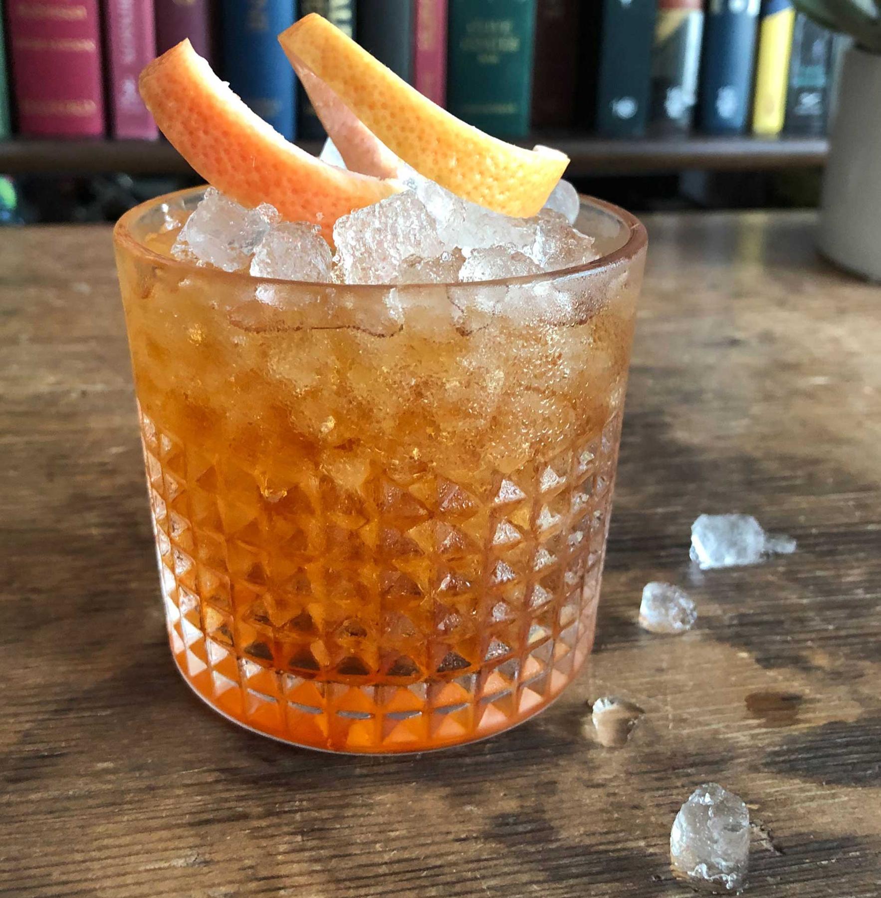 An example of the Savage Love, the mixed drink (drink), by Jesse Harris, Leyenda, Brooklyn, featuring cava, Amaro di Angostura, Aperitivo Cappelletti, Cocchi Vermouth di Torino ‘Storico’, Salers Gentian Apéritif, and grapefruit twist; photo by Lee Edwards