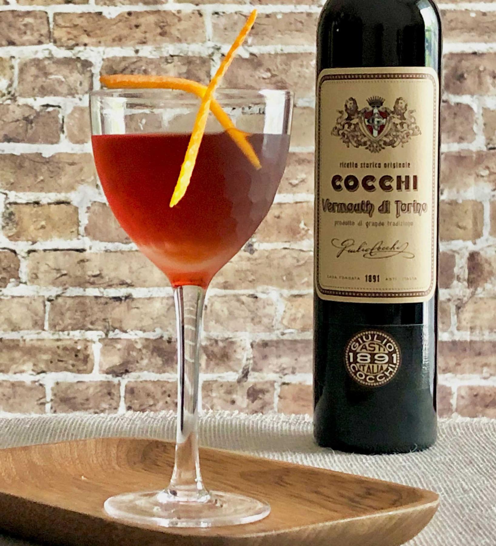 An example of the Golden Grove, the mixed drink (drink) featuring Cocchi Vermouth di Torino ‘Storico’, Smith & Cross Traditional Jamaica Rum, maraschino liqueur, orange bitters, and orange twist; photo by Lee Edwards