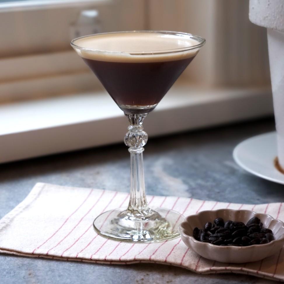 An example of the Haus Espresso Martini, the mixed drink (drink) featuring vodka, espresso coffee, Meunier Cacao Noir Liqueur, coffee-flavored liqueur, and Rothman & Winter Orchard Cherry Liqueur; photo by Madison Young