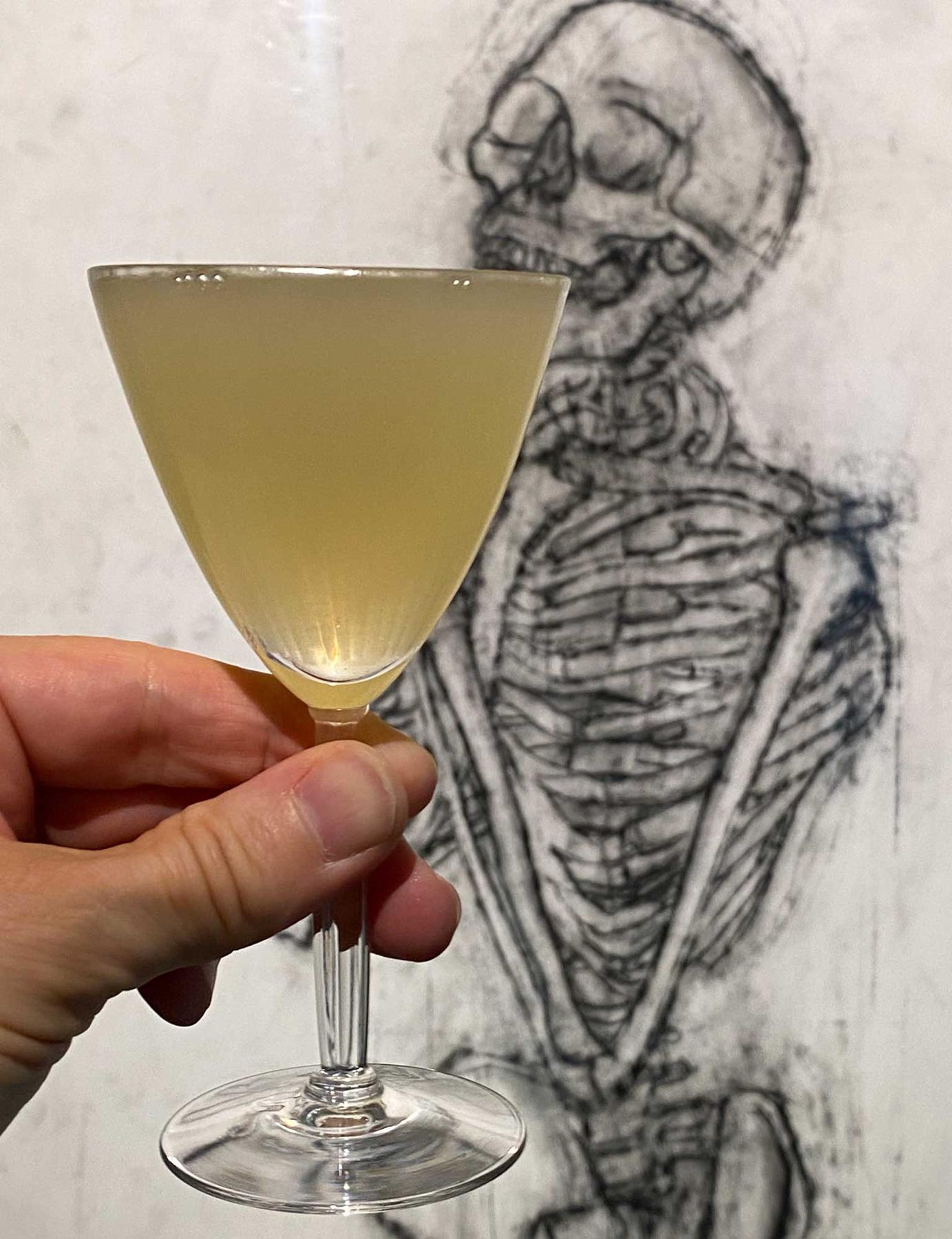 An example of the Corpse Reviver #2, the mixed drink (drink) featuring Hayman’s London Dry Gin, Cocchi Americano Bianco, orange-flavored liqueur, and lemon juice; photo by Martin Doudoroff