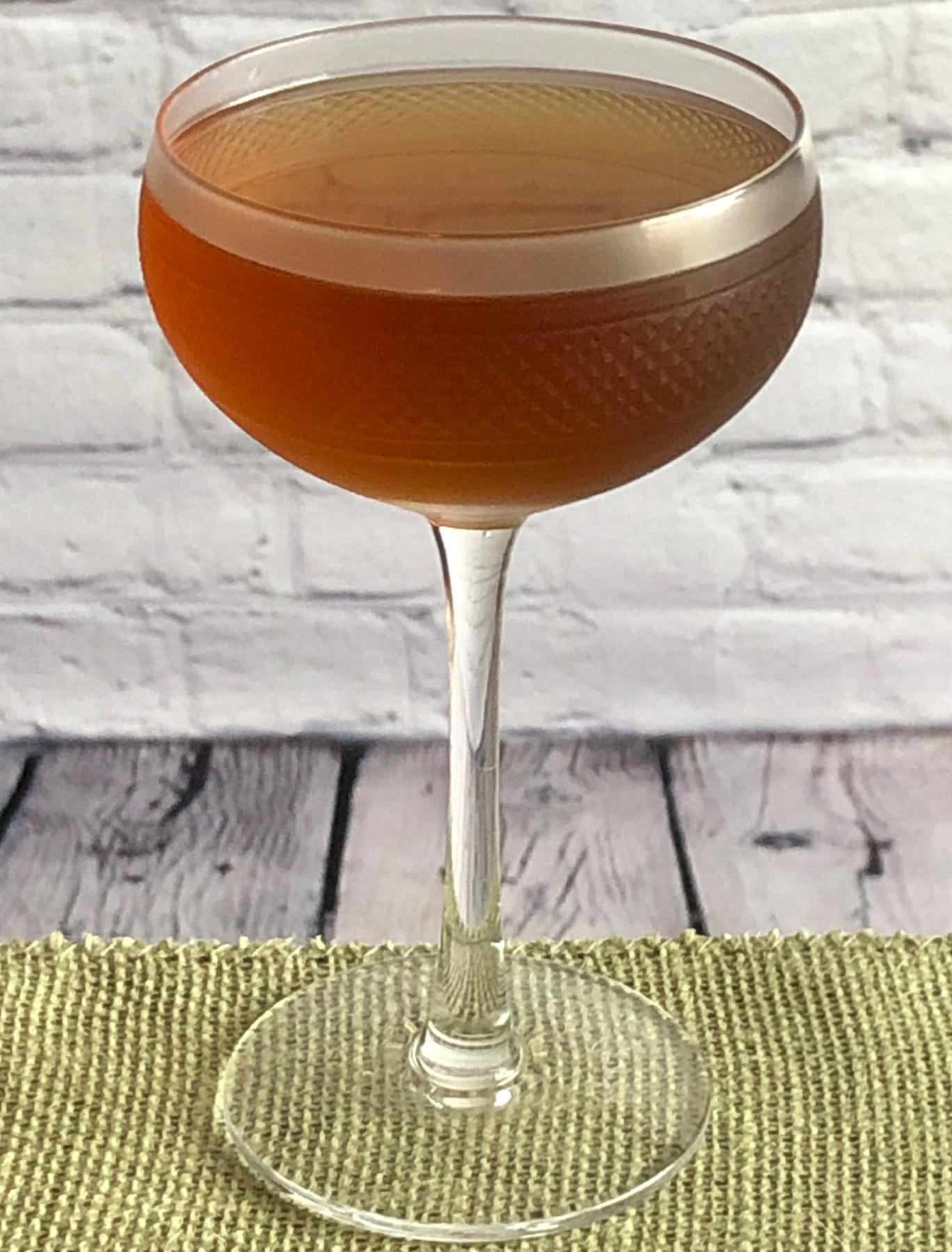 An example of the Hanky Panky, the mixed drink (drink) featuring Hayman’s London Dry Gin, Dolin Rouge Vermouth de Chambéry, Elisir Novasalus, and orange bitters; photo by Lee Edwards
