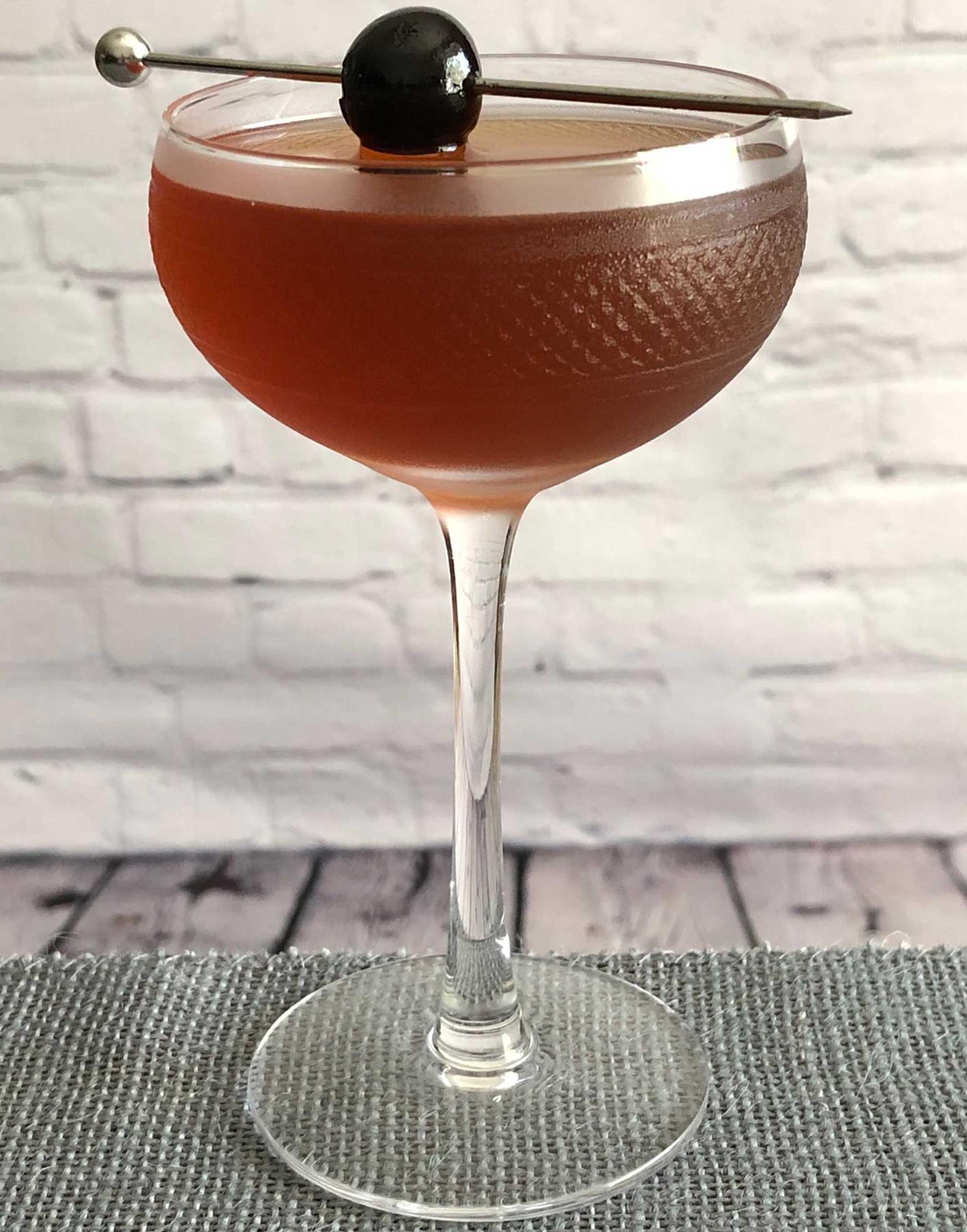 An example of the Remember the Maine, the mixed drink (drink) featuring rye whiskey, Cocchi Vermouth di Torino ‘Storico’, Rothman & Winter Orchard Cherry Liqueur, absinthe, and maraschino cherry; photo by Lee Edwards