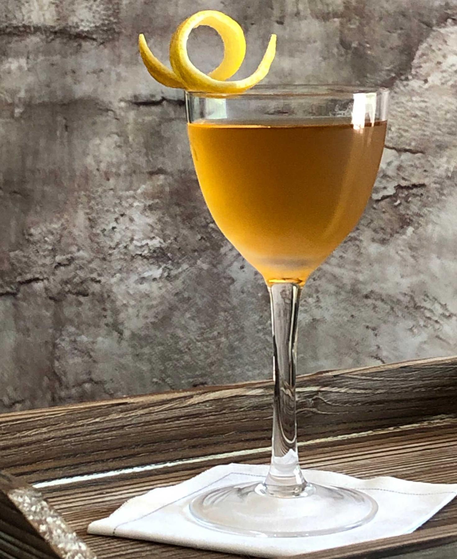 An example of the Czarina, the mixed drink (drink), by David Embury, The Art of Mixing Drinks, featuring vodka, Blume Marillen Apricot Eau-de-Vie, Dolin Dry Vermouth de Chambéry, Cocchi Vermouth di Torino ‘Storico’, and lemon twist; photo by Lee Edwards