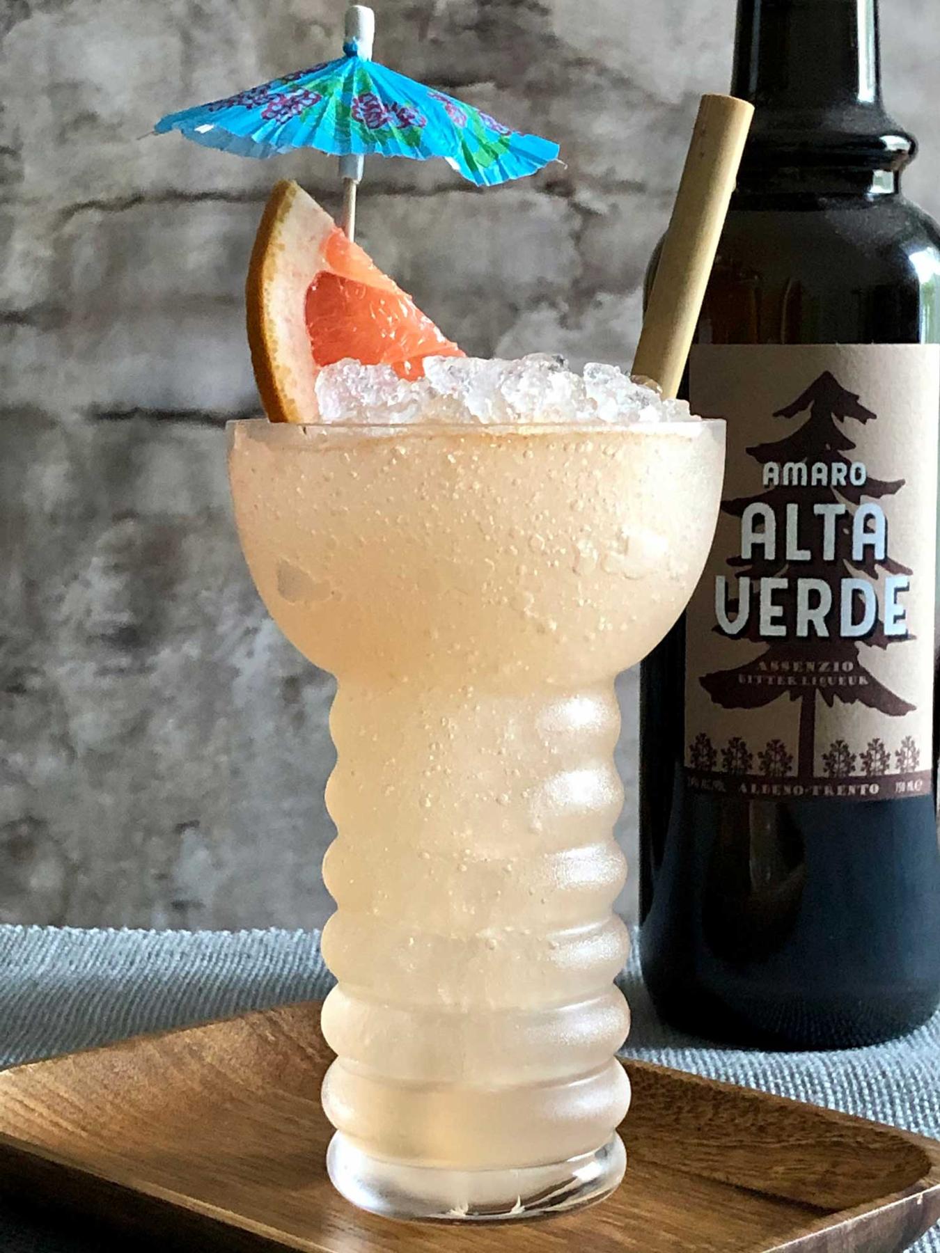 An example of the Land Ahoy, the mixed drink (drink), by Based on a drink by Rob Ficks, The Hawthorne, Boston, MA, featuring Hayman’s Old Tom Gin, grapefruit juice, John D. Taylor’s Velvet Falernum, Amaro Alta Verde, vanilla syrup, and crushed ice; photo by Lee Edwards