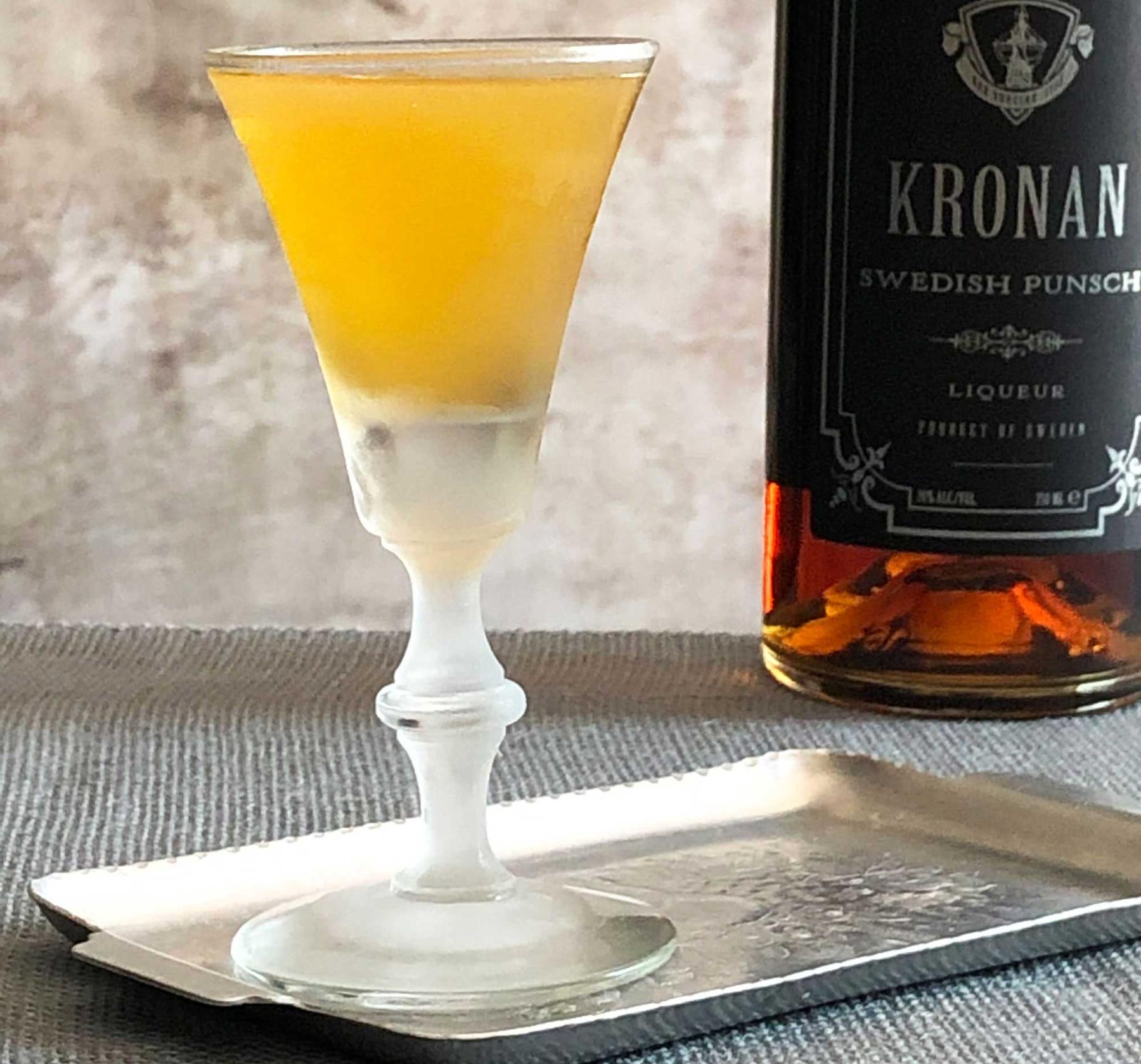An example of the Tangier Nights, the mixed drink (drink), by By Freddy Janowitz, featuring KRONAN Swedish Punsch, cognac, and crème de menthe (white); photo by Lee Edwards