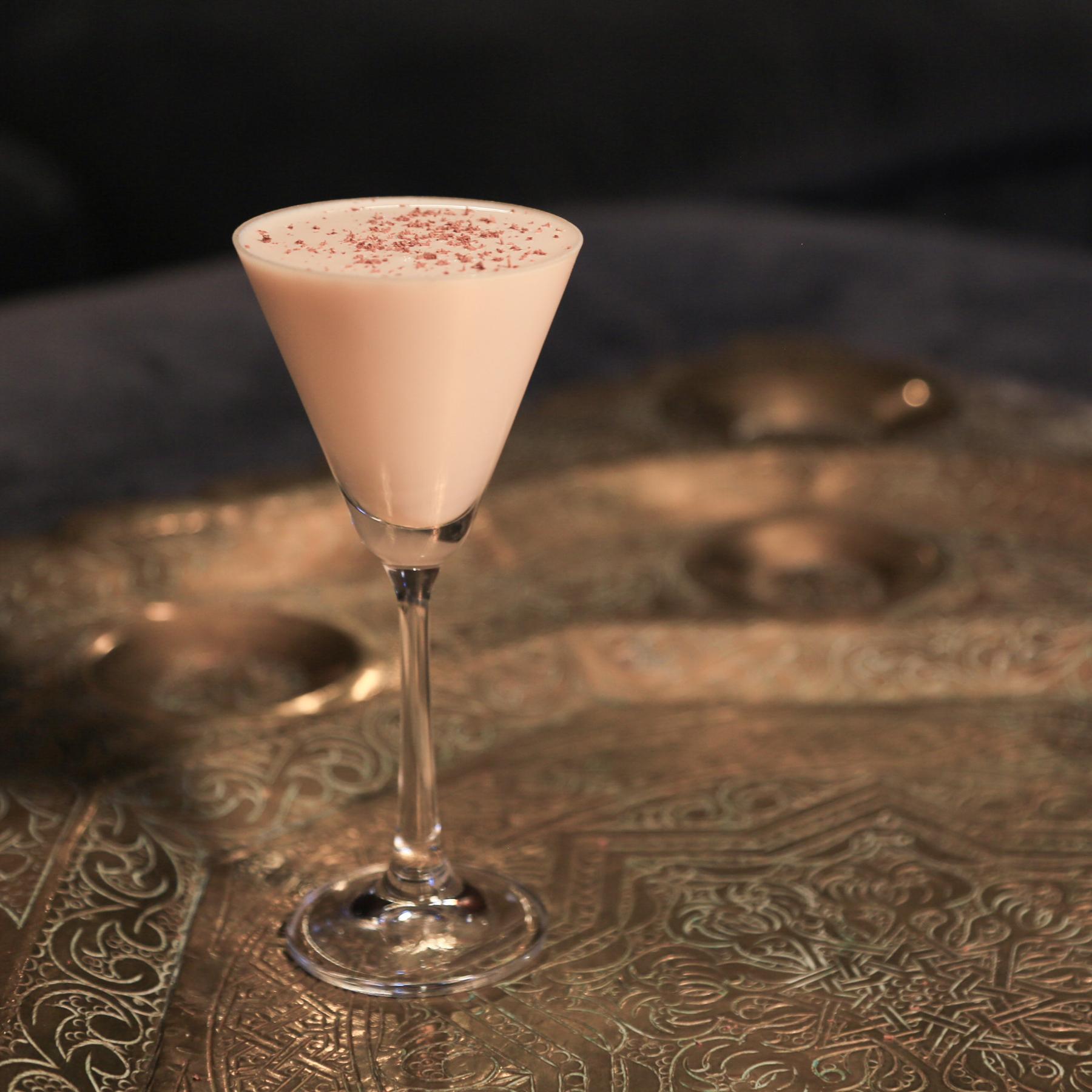 An example of the Alpine Hug, the mixed drink (drink) featuring Meunier Cacao Noir Liqueur, Meunier Génépy ‘Altitude’ Liqueur, and cream; photo by Megan Heinowski