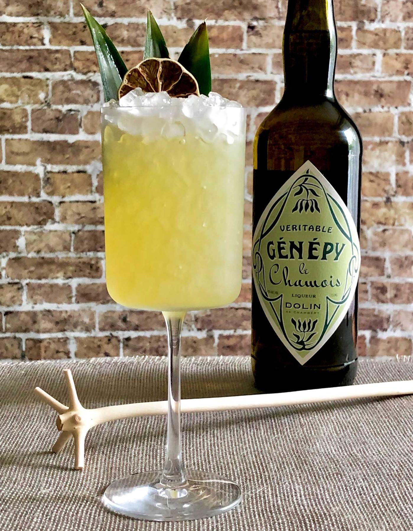 An example of the Génépy Swizzle, the mixed drink (drink), by Based on the Chartreuse Swizzle by Marcovaldo Dionysos, San Francisco, California, featuring Dolin Génépy le Chamois Liqueur, pineapple juice, John D. Taylor’s Velvet Falernum, lime juice, and pineapple leaf; photo by Lee Edwards