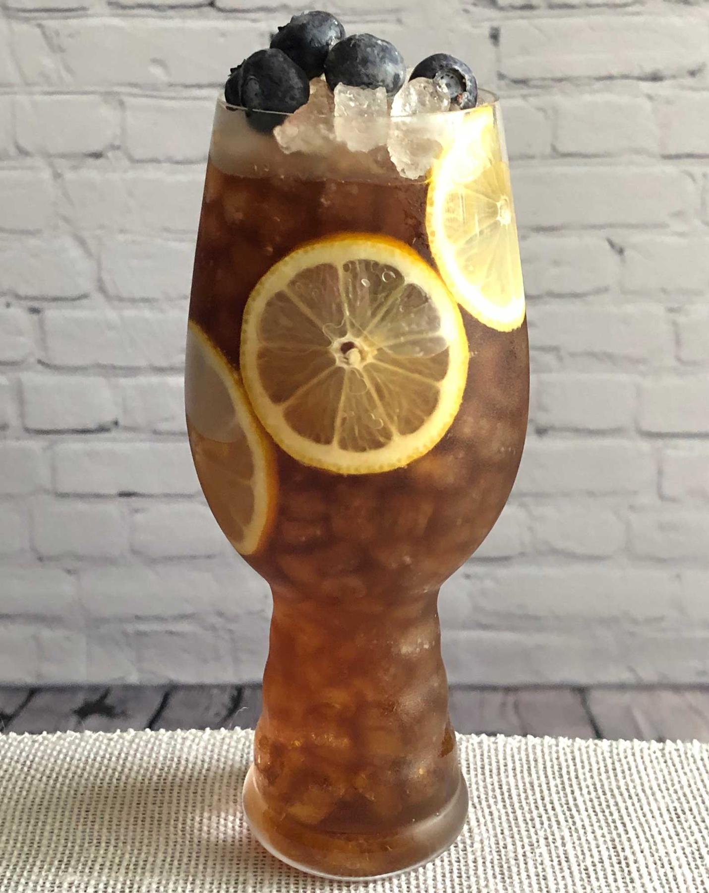 An example of the Pasubio & Coke, the mixed drink (drink) featuring Coca Cola, Pasubio Vino Amaro, and squeeze of lemon; photo by Lee Edwards