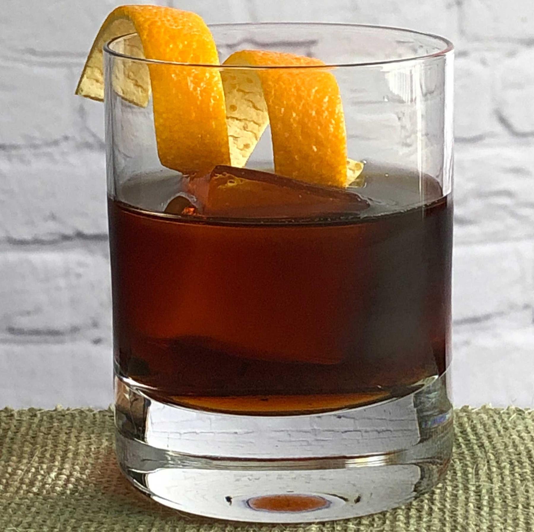 An example of the Amaricanto, the mixed drink (drink) featuring Cocchi Vermouth di Torino ‘Storico’, Elisir Novasalus, and orange bitters; photo by Lee Edwards