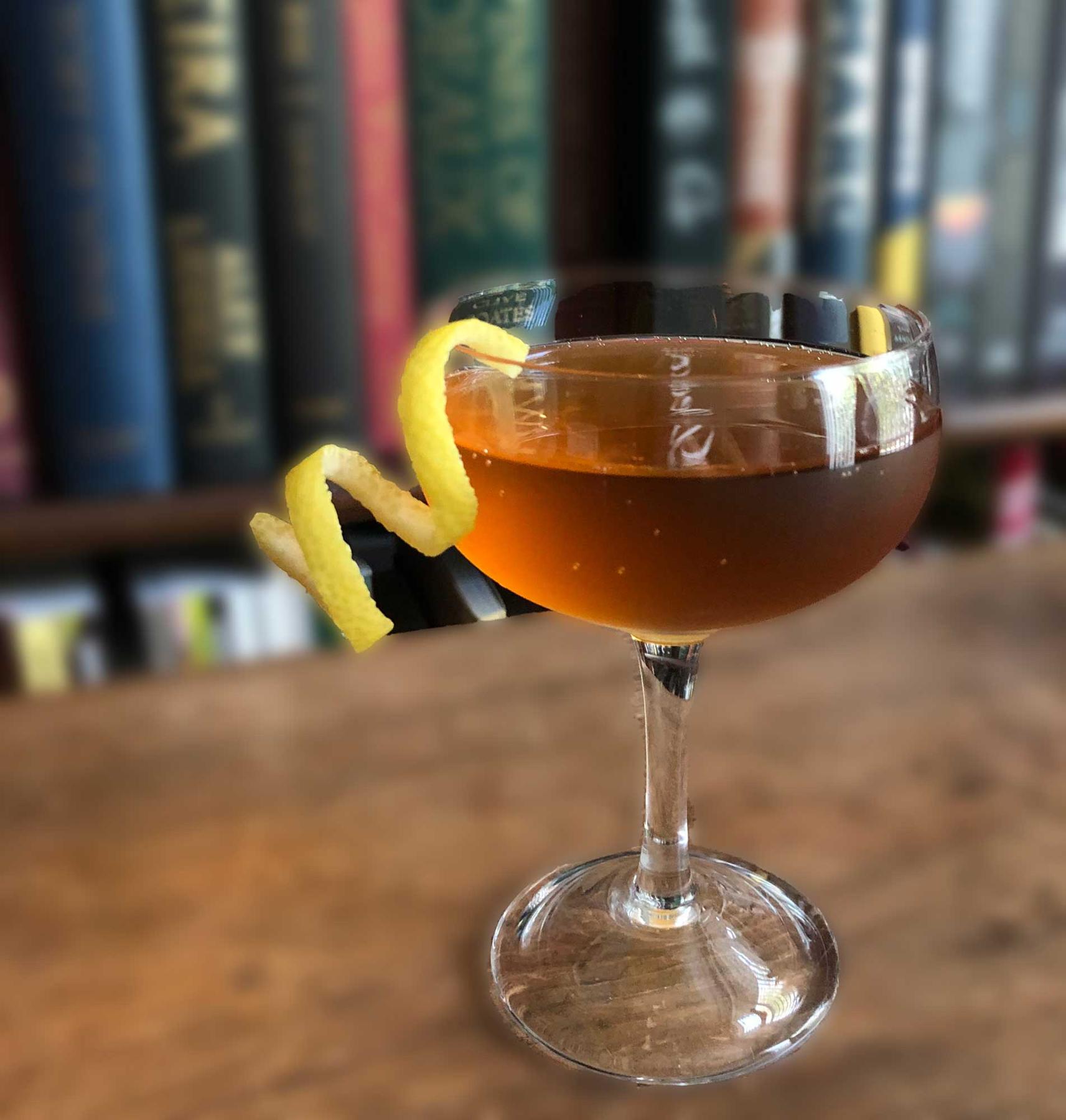 An example of the Familia Cocktail, the mixed drink (drink) featuring Cocchi Asti DOCG, Cardamaro Vino Amaro, and lemon twist; photo by Lee Edwards