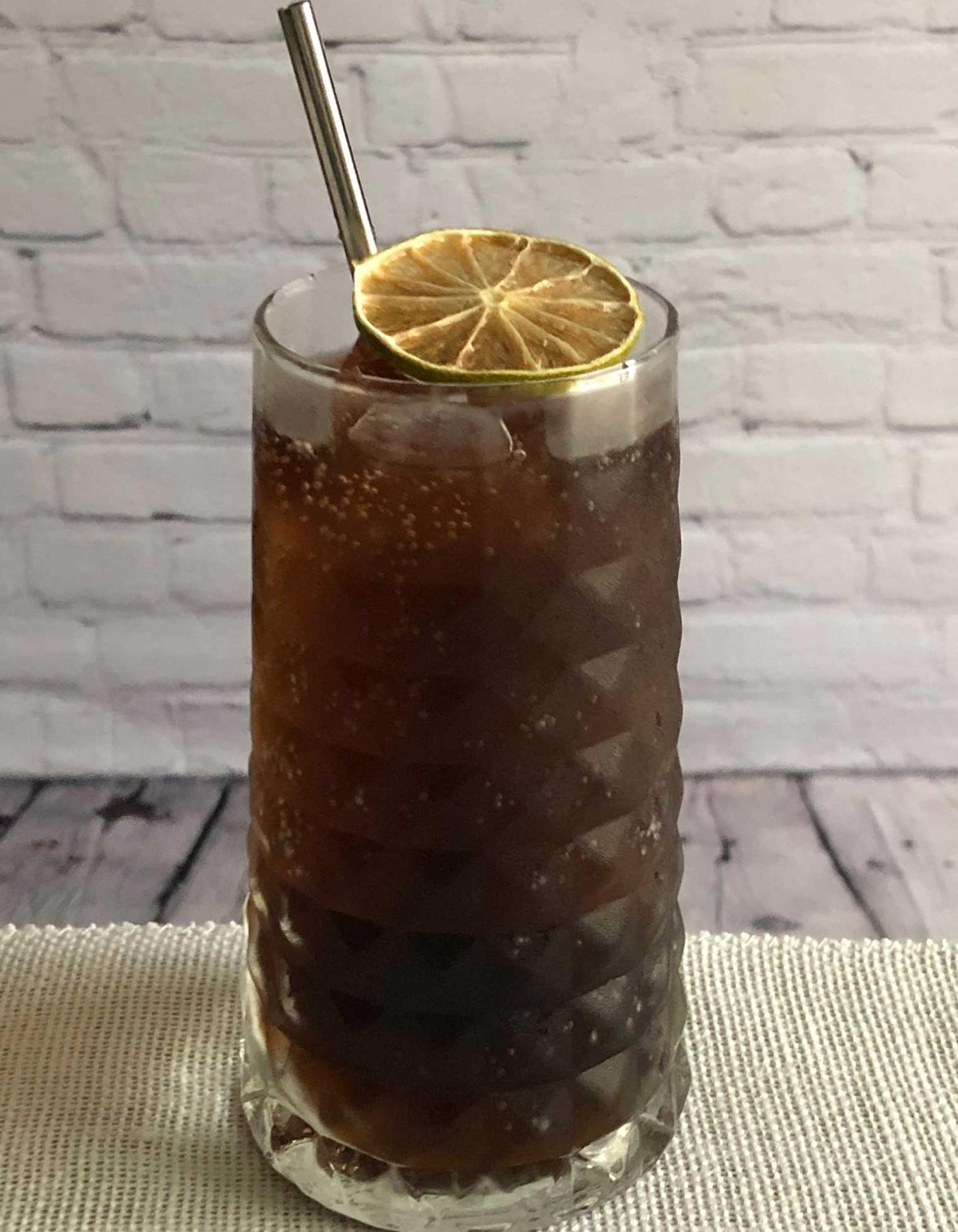 An example of the Cuba Libre, the mixed drink (drink) featuring cola, The Scarlet Ibis Trinidad Rum, lime juice, and Angostura bitters; photo by Lee Edwards