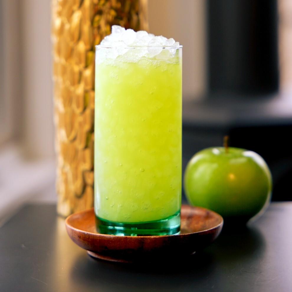 An example of the Apple Garibaldi, the mixed drink (drink), by PUNCH, Brooklyn, NY, featuring Comoz Blanc Vermouth de Chambèry, manzanilla, gin, and granny smith apple