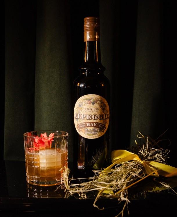 An example of the Hay Now, Hay Now, the mixed drink (drink), by Ariana Victoria, Lockhart, TX, featuring Alpeggio Hay Liqueur, Cocchi Vermouth di Torino ‘Storico’, and rye whiskey; photo by Lisa Hause