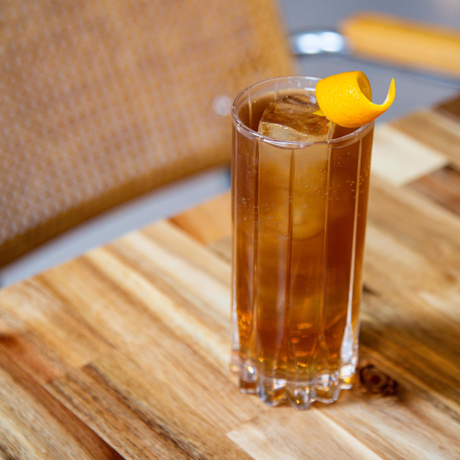 An example of the Shift Drink, the mixed drink (drink), by Paul Imbesi, Barritt’s Ginger Beer, featuring ginger beer, Dolin Rouge Vermouth de Chambéry, and orange twist; photo by Megan Heinowski