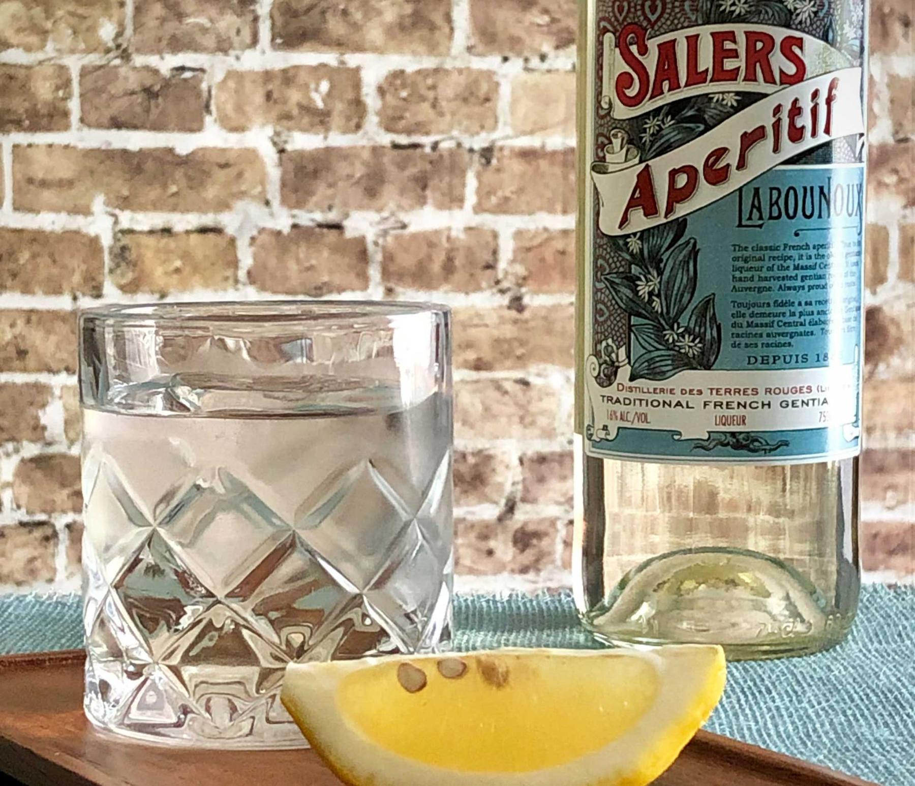 An example of the Salers Aperitif, the mixed drink (drink) featuring Salers Gentian Apéritif and squeeze of lemon; photo by Lee Edwards