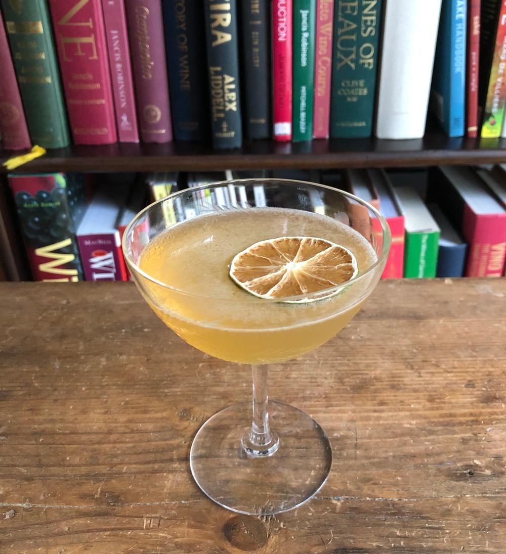 An example of the Jamaica Daiquiri, the mixed drink (drink) featuring Smith & Cross Traditional Jamaica Rum, lime juice, simple syrup, Angostura bitters, and lime wheel; photo by Lee Edwards