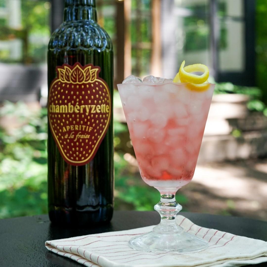 An example of the Franch Water, the mixed drink (drink) featuring soda water, vodka, Chamberyzette, and lemon twist; photo by Madison Young