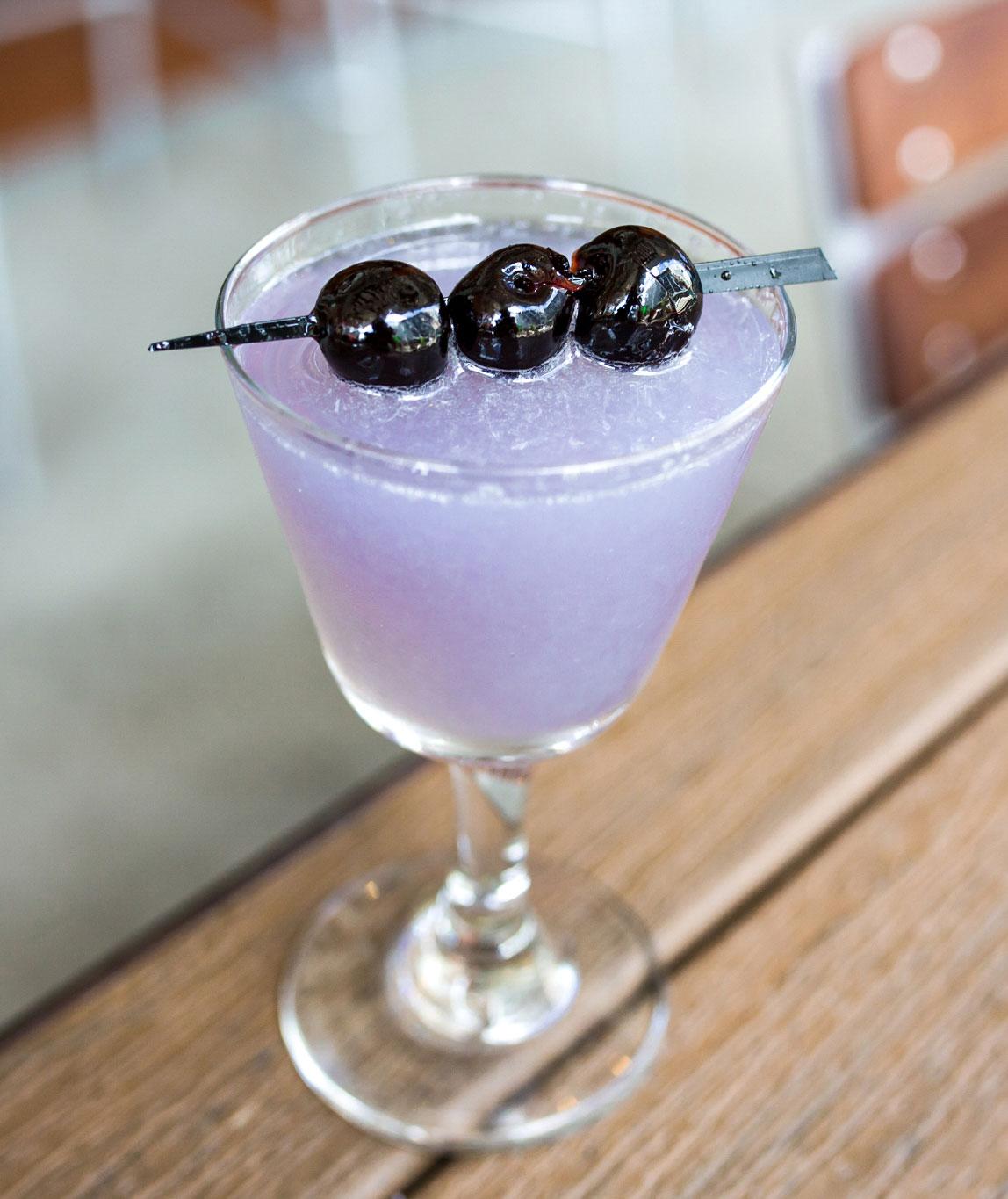 An example of the Aviation, the mixed drink (drink) featuring Hayman’s London Dry Gin, lemon juice, maraschino liqueur, and Rothman & Winter Crème de Violette; photo by Carolina Stamey, STIR, Chattanooga