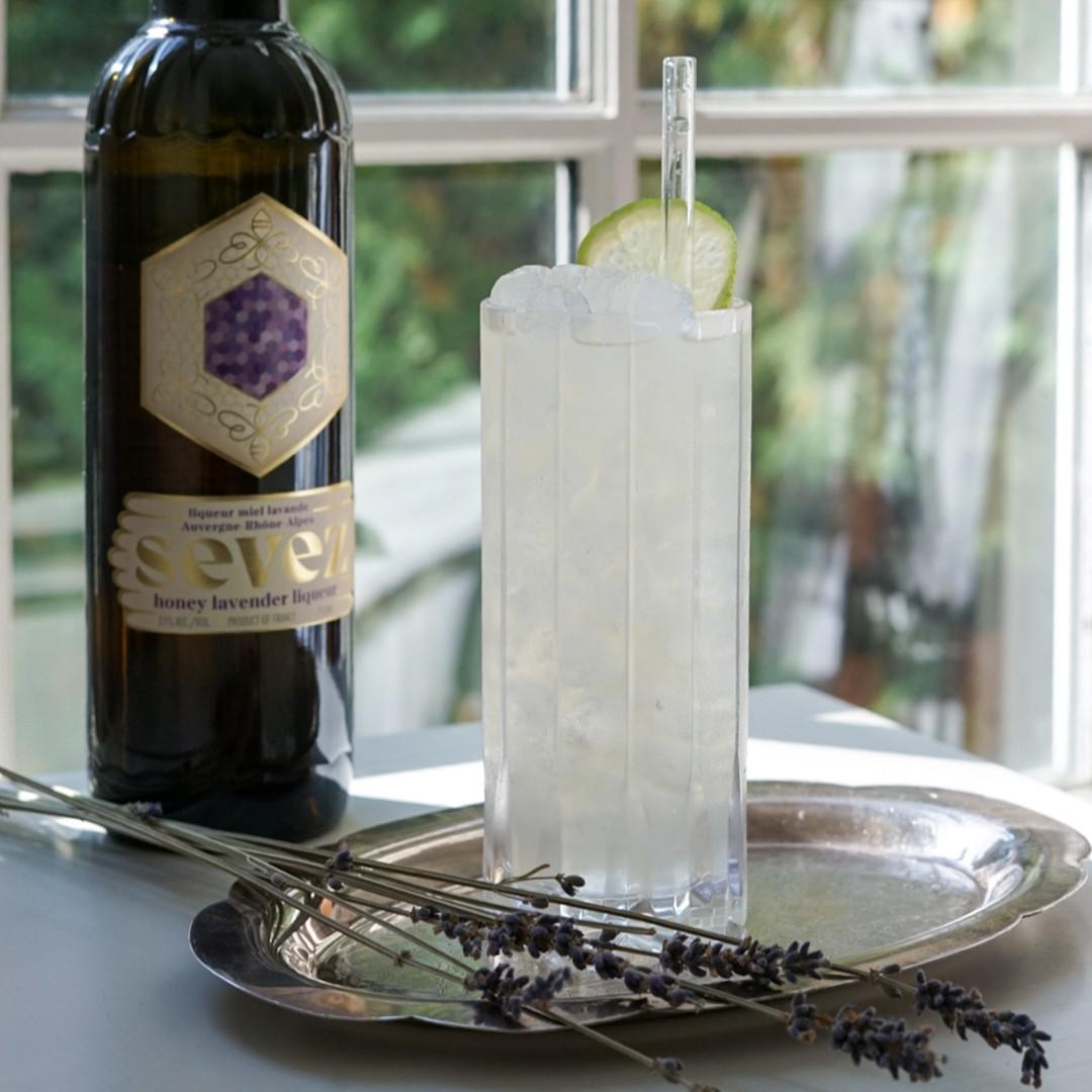 An example of the Meribel Mule, the mixed drink (drink) featuring ginger ale, vodka, Sevez Honey Lavender, lime juice, and lime wheel; photo by Madison Young