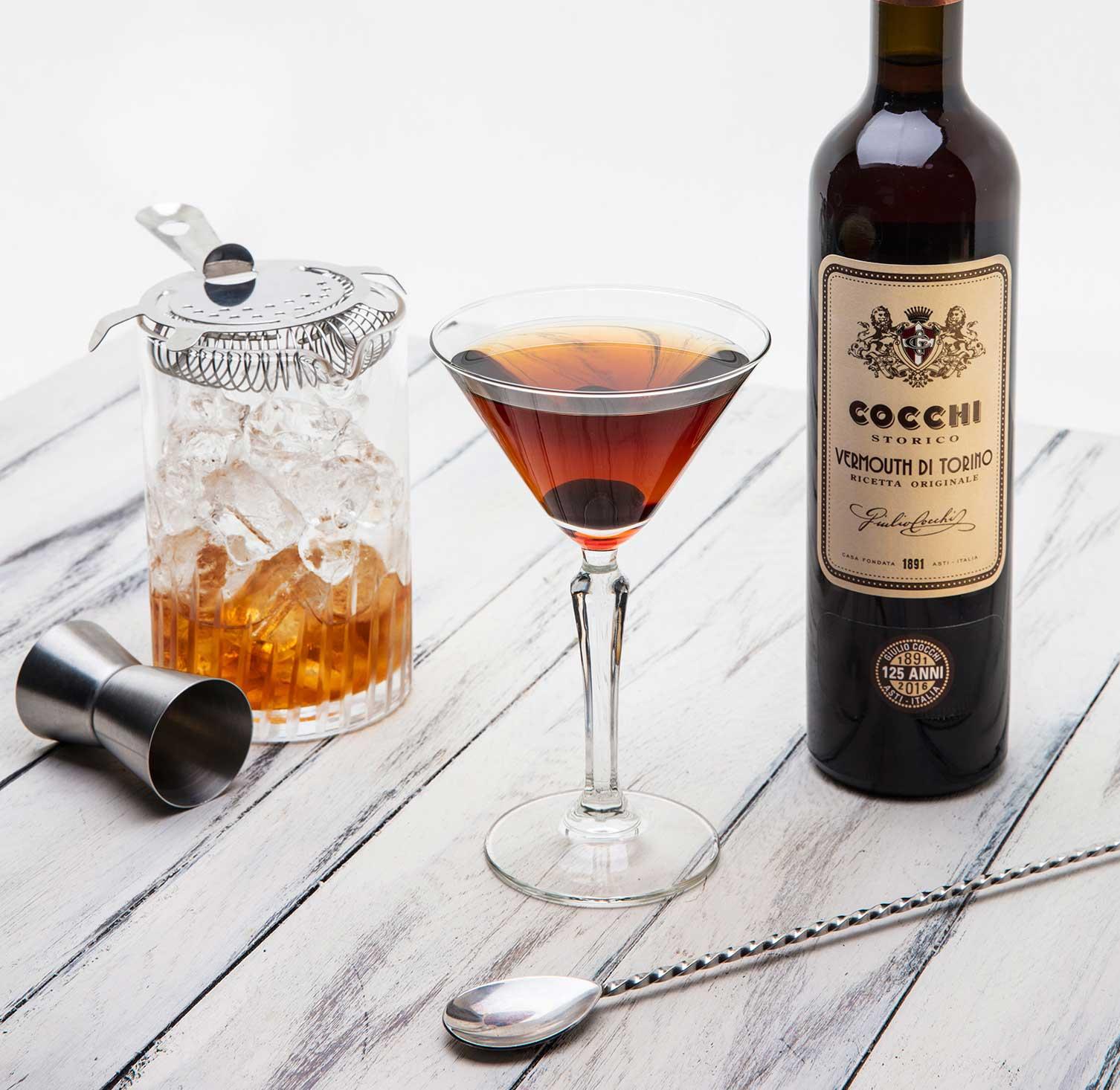 An example of the Rye Manhattan, the mixed drink (drink) featuring rye whiskey, Cocchi Vermouth di Torino ‘Storico’, Angostura bitters, orange twist, and maraschino cherry; photo by Giulio Cocchi Spumanti Srl