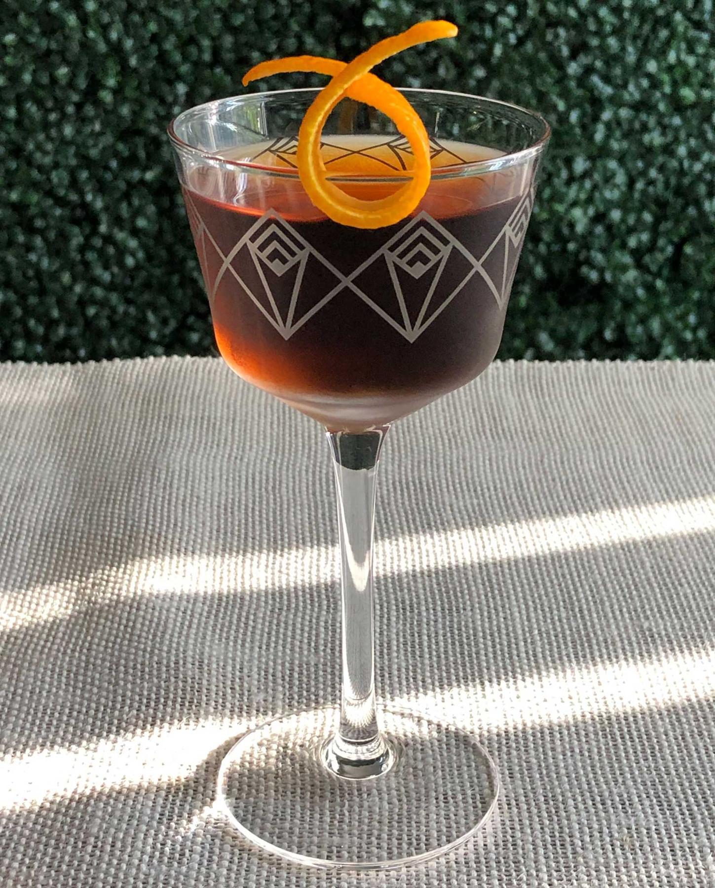 An example of the Reforma, the mixed drink (drink) featuring reposado tequila, Bonal Gentiane-Quina, orange bitters, and orange twist; photo by Lee Edwards
